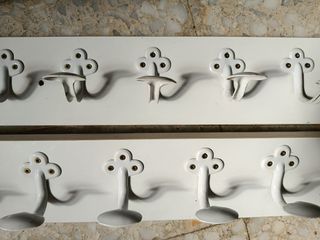 Colgador - perchero de pared.