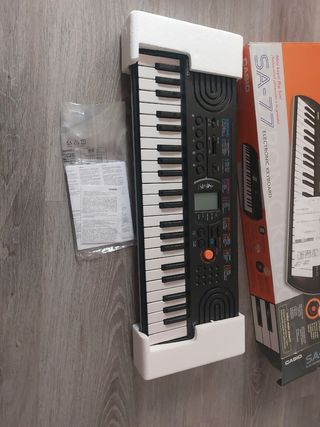 Casio sa 77 piano con cargador