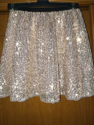 Falda lentejuelas . 
Talla 10-11 años (140-146cm)