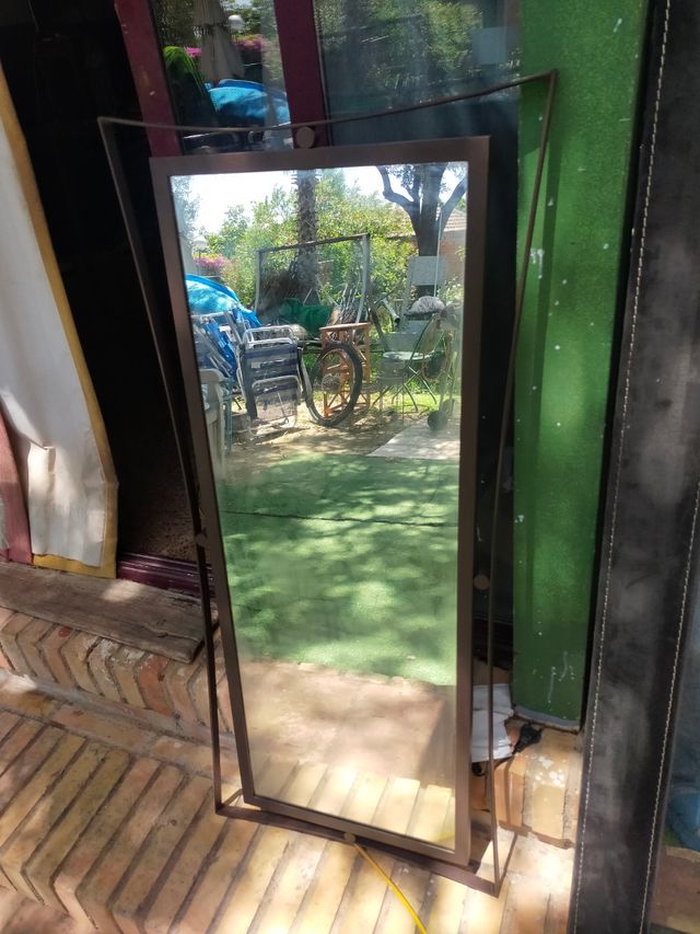 Espejo y decoración forja