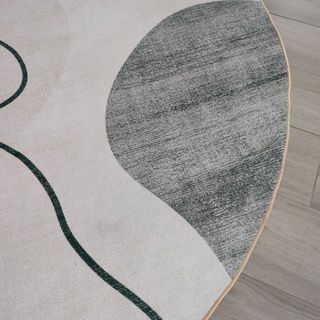 Alfombra redonda beige y gris