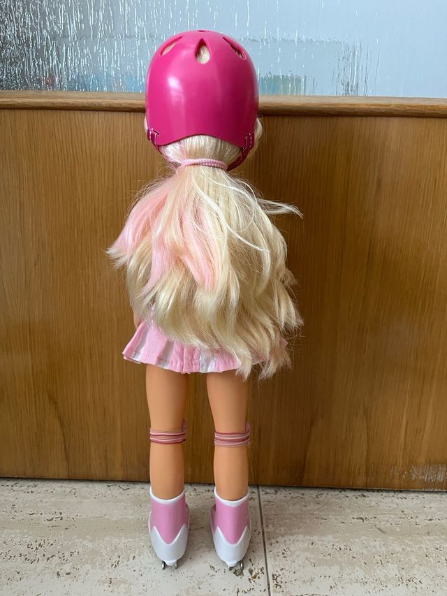 Nancy con accesorios y vestidos