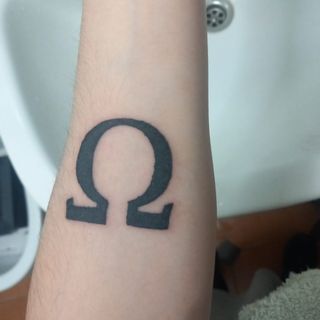 Tatuaje Omega