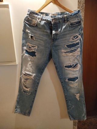 Calças de ganga rasgadas