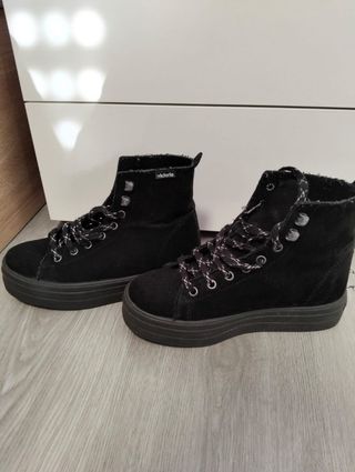 Variedad Botas negras.