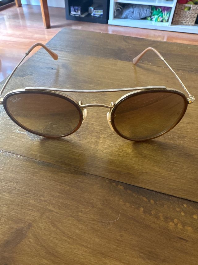 Rayban redondas doradas