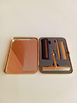 Maquinilla afeitar dorada antigua