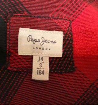 Vestido camisero niña. Perfil solidario
