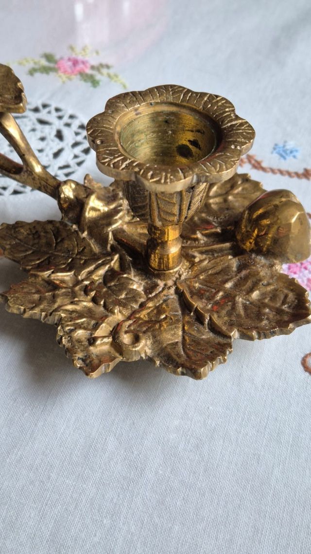 Portavelas de bronce