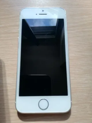 iPhone SE 2017 con cargador y cable originales