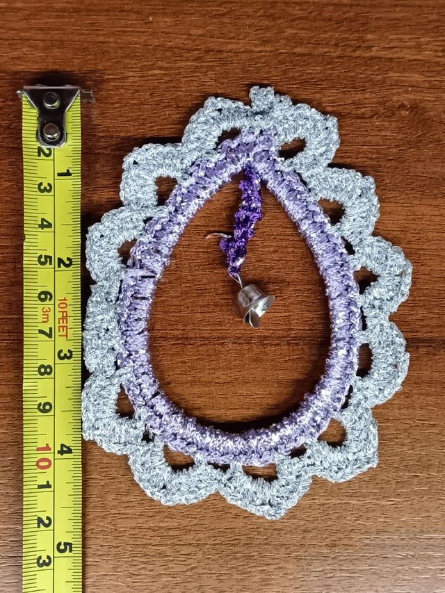 Decoro in pizzo con campanellino