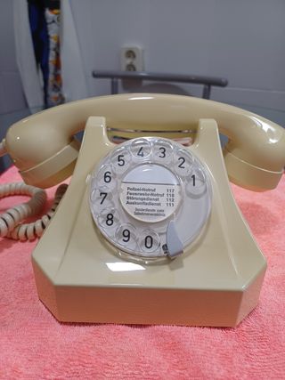 Telefono antiguo lmpecable vintage de mesa