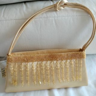 Bolso mano beige dorado fiesta