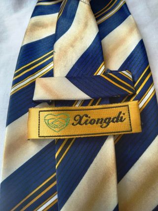 Corbata Xiongdi a Rayas Azul Marino y Oro