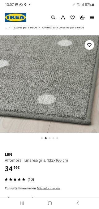 Alfombra Ikea gris lunares blancos