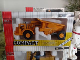 JOAL tractor CAT 631 con volquete