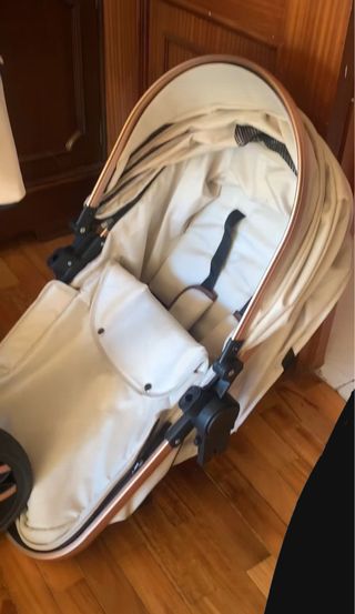 Cochecito bebé beige-dorado