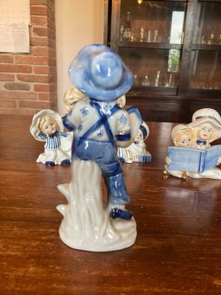 Statuine bimbi porcellana blu