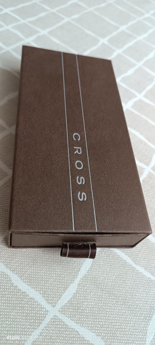 Penna con firma a croce