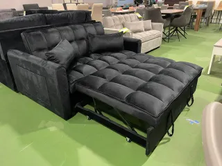 Sofa cama tapizado en suave gris oscuro