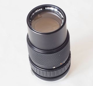 Objetivo Olympus OM 75-150mm F4 + funda rígida