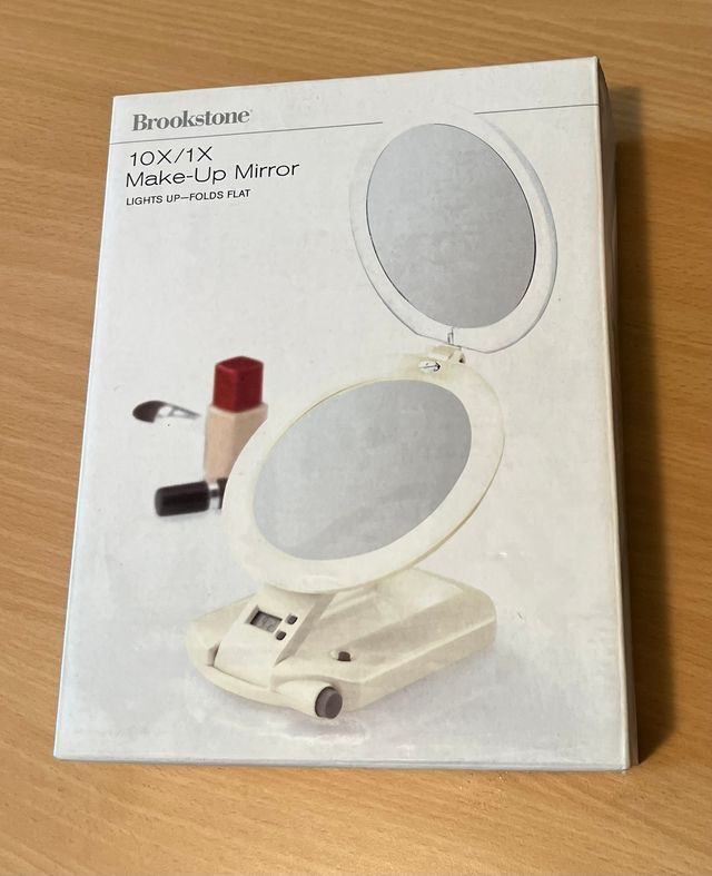 Espejo doble con luz y aumento 10x