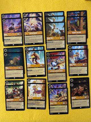 Cartas Lorcana Ámbar poco comunes