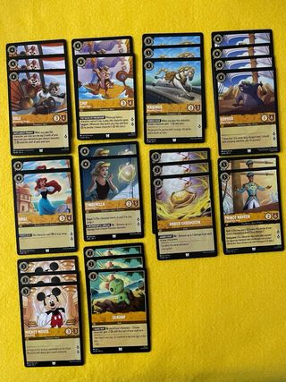 Cartas Lorcana Ámbar poco comunes