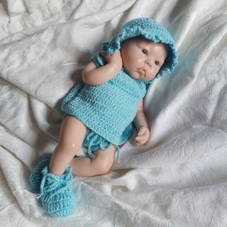 Reborn muñeco silicona.