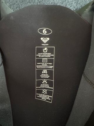 Tabla surf y traje neopreno