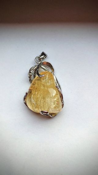 Ciondolo artigianale 18kgp pietra gialla