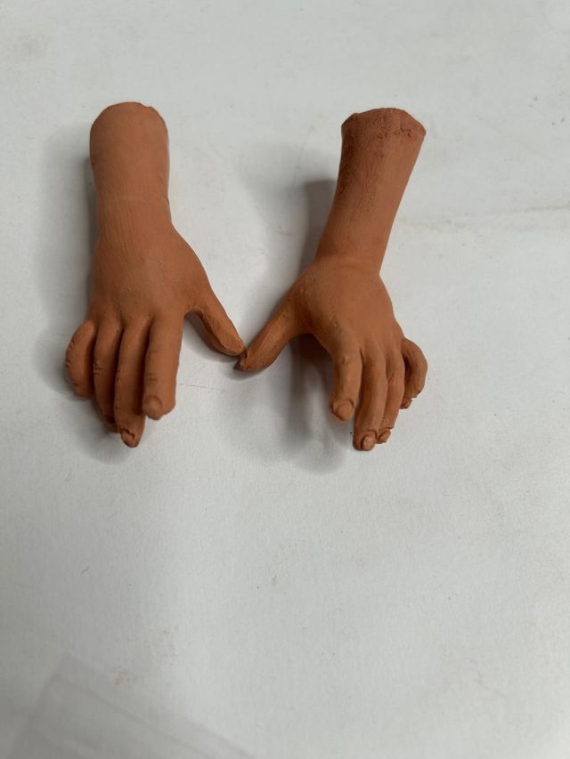 Mani in terracotta