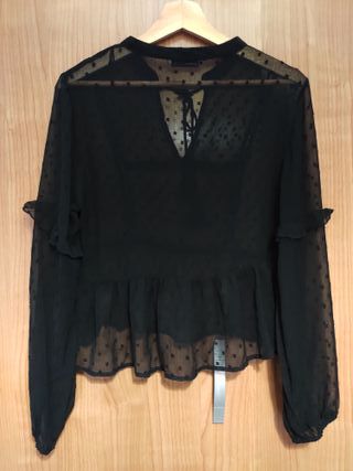 Blusa plumeti negra talla M Stradivarius 