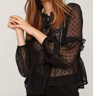 Blusa plumeti negra talla M Stradivarius 