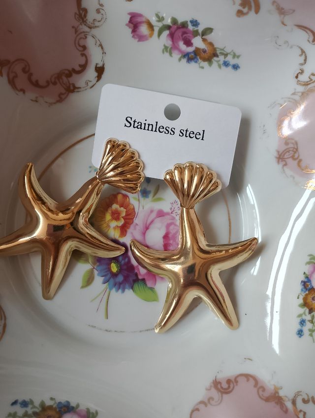 Orecchini dorati stella pendenti estate