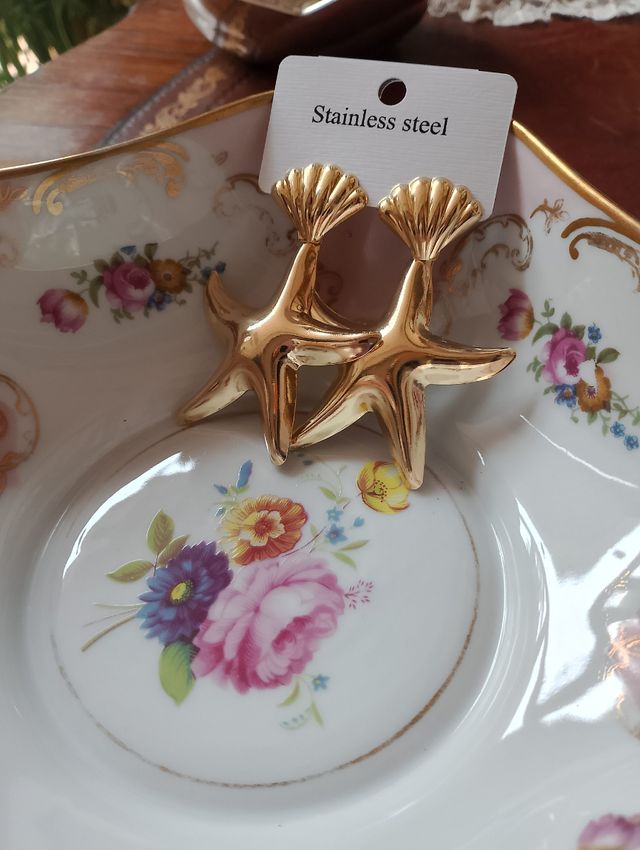 Orecchini dorati stella pendenti estate