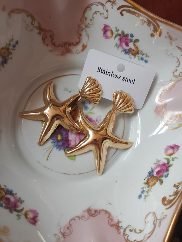 Orecchini dorati stella pendenti estate