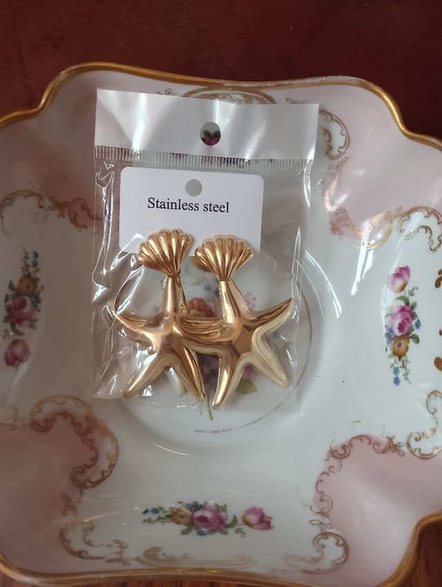 Orecchini dorati stella pendenti estate