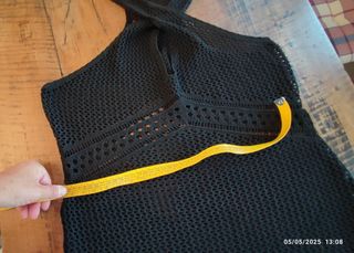 Copricostume nero traforato