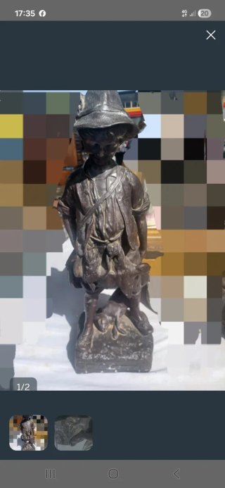 Figura de bronce niño cazador