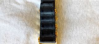 Cinturón Versace negro y dorado