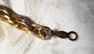 Collar y pulsera bañado en oro 