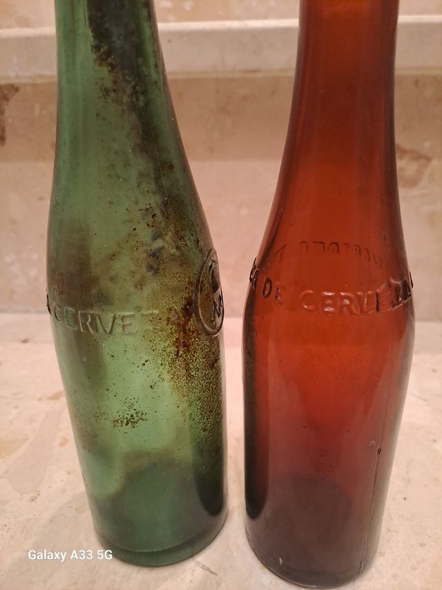 Botellas antiguas Cerveza  Moritz y huertana relie