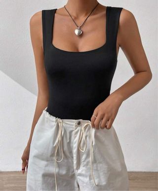 Body negro - prenda exterior