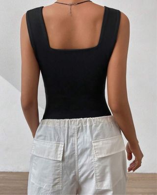 Body negro - prenda exterior