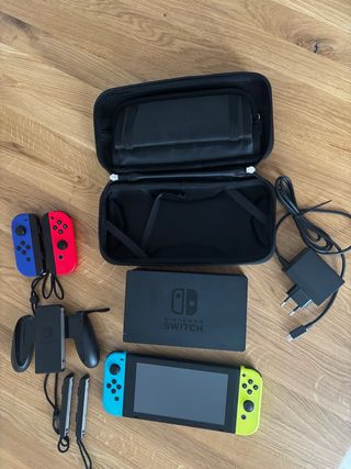 Nintendo Switch  Perfecto estado  estuche de viaje  mando extra