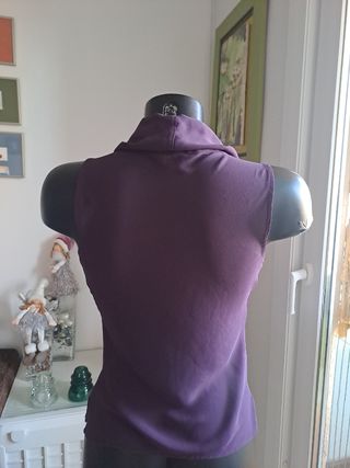 Blusa sin mangas cuello vuelto
