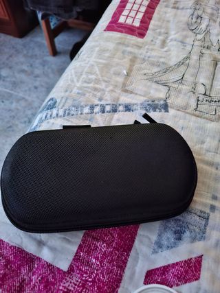 PSP con funda y juegos