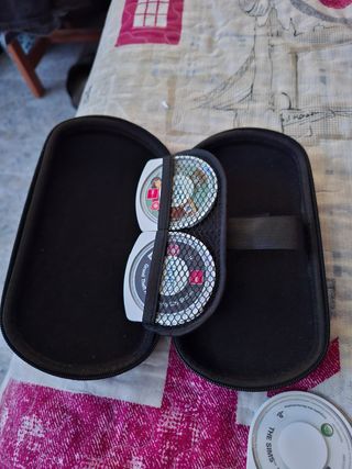 PSP con funda y juegos