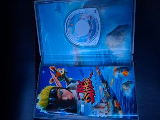 PSP con funda y juegos